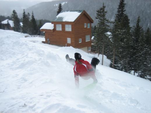 Catching air from sledding in Breckenridge